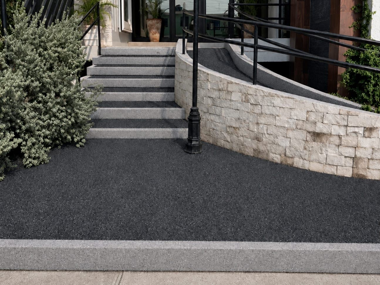 Render del acceso con granito granulado gris oscuro en piso y escalones